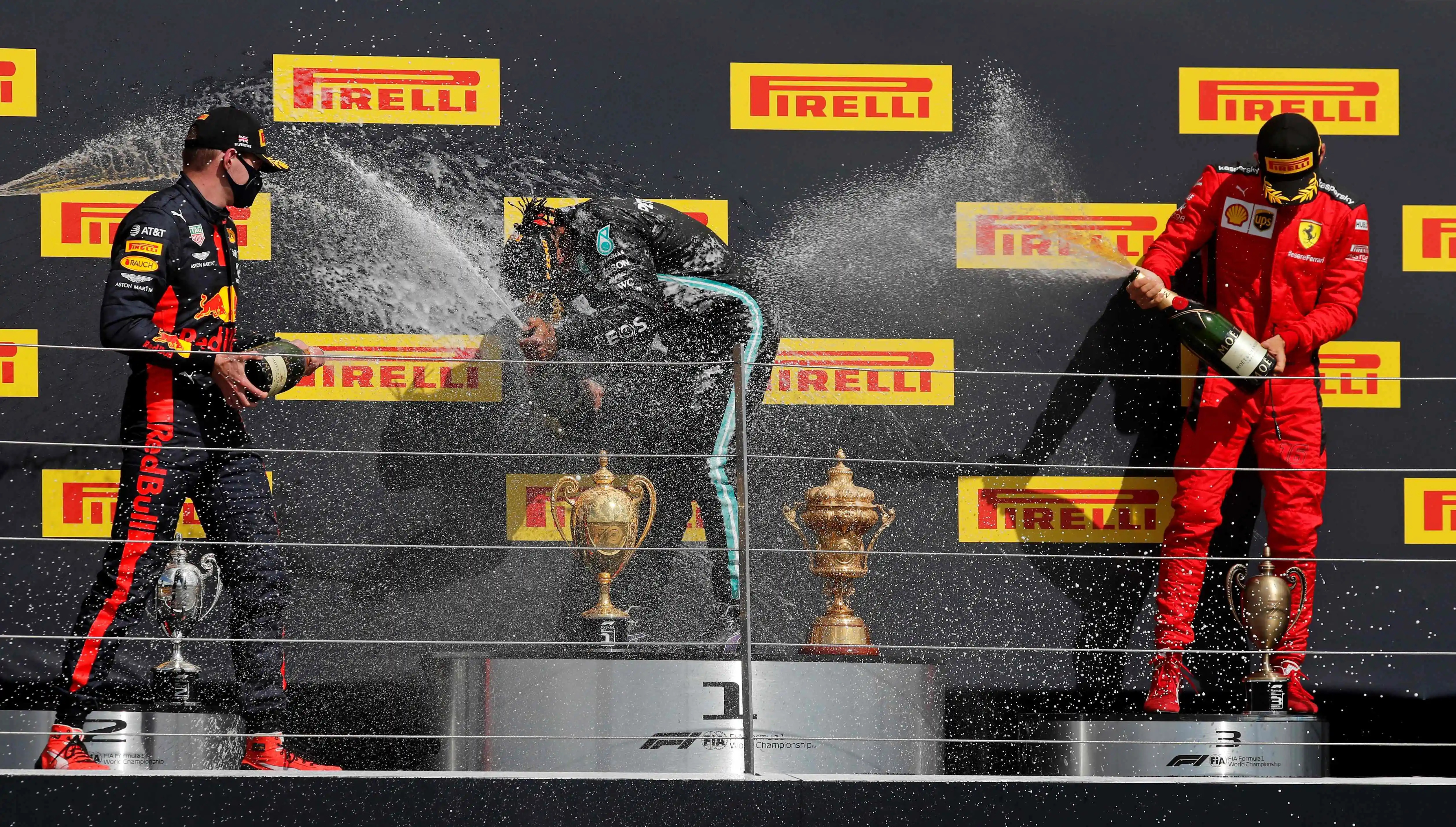 Celebrating Lewis Hamilton's win with champeign (Taken from: https://www.thesun.co.uk/sport/motorsport/14217341/champagne-podium-f1-2021-sparkling-wine-ferrari/)